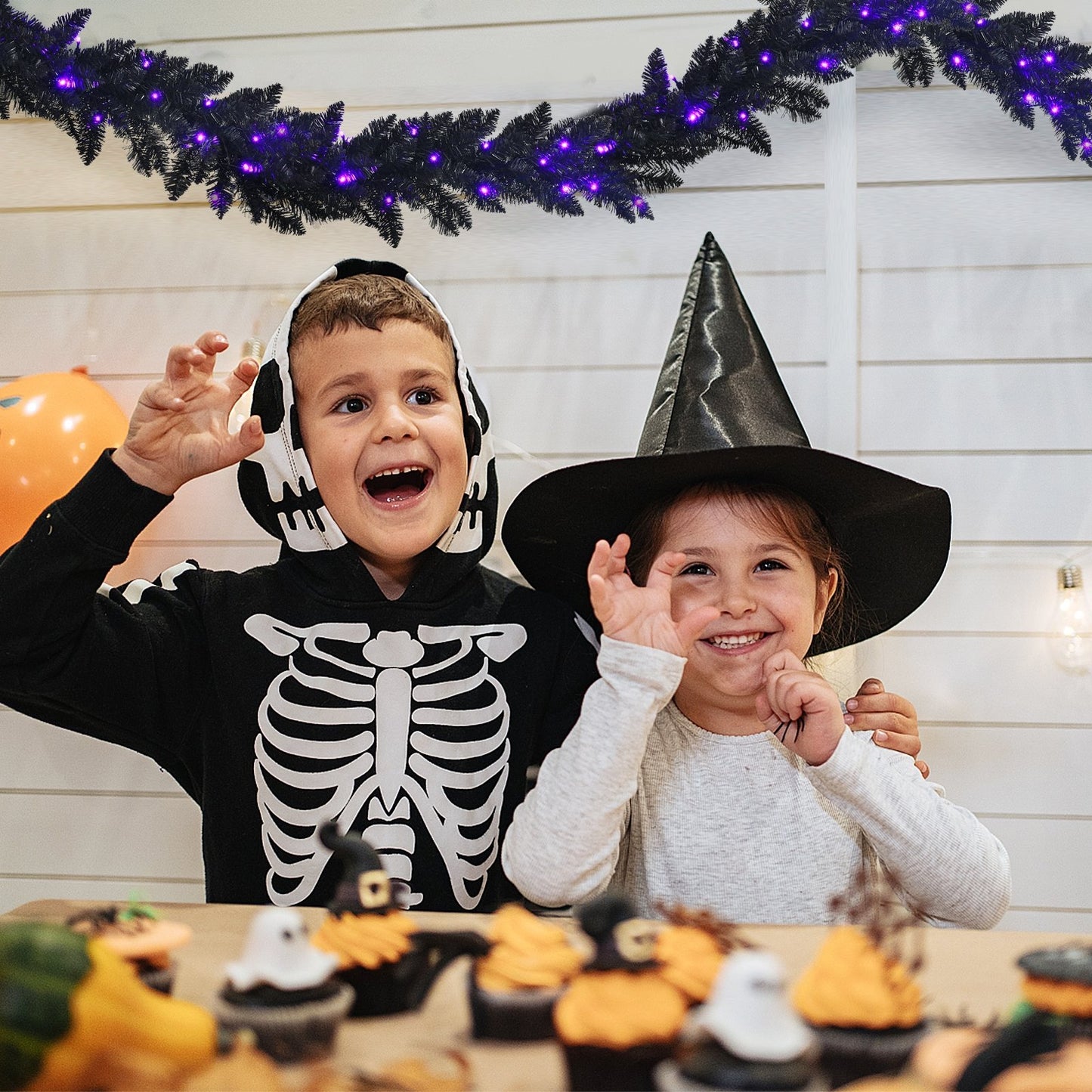 9 Feet Pre-lit Christmas Halloween Garland with 50 Purple LED Lights, Black - Gallery Canada