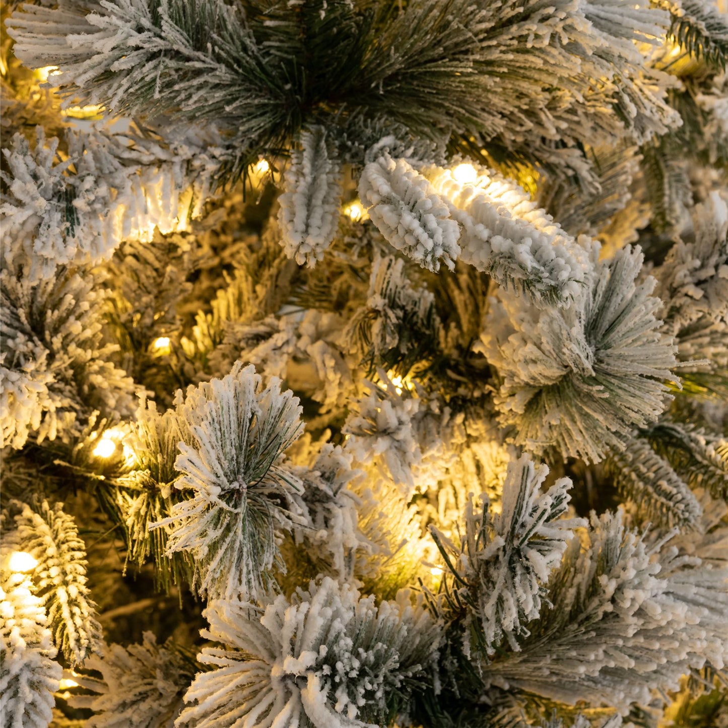 Flocked Christmas Tree with 250 Warm White LED Lights and 752 Mixed Branch Tips-7 ft, Green Christmas Tree   at Gallery Canada