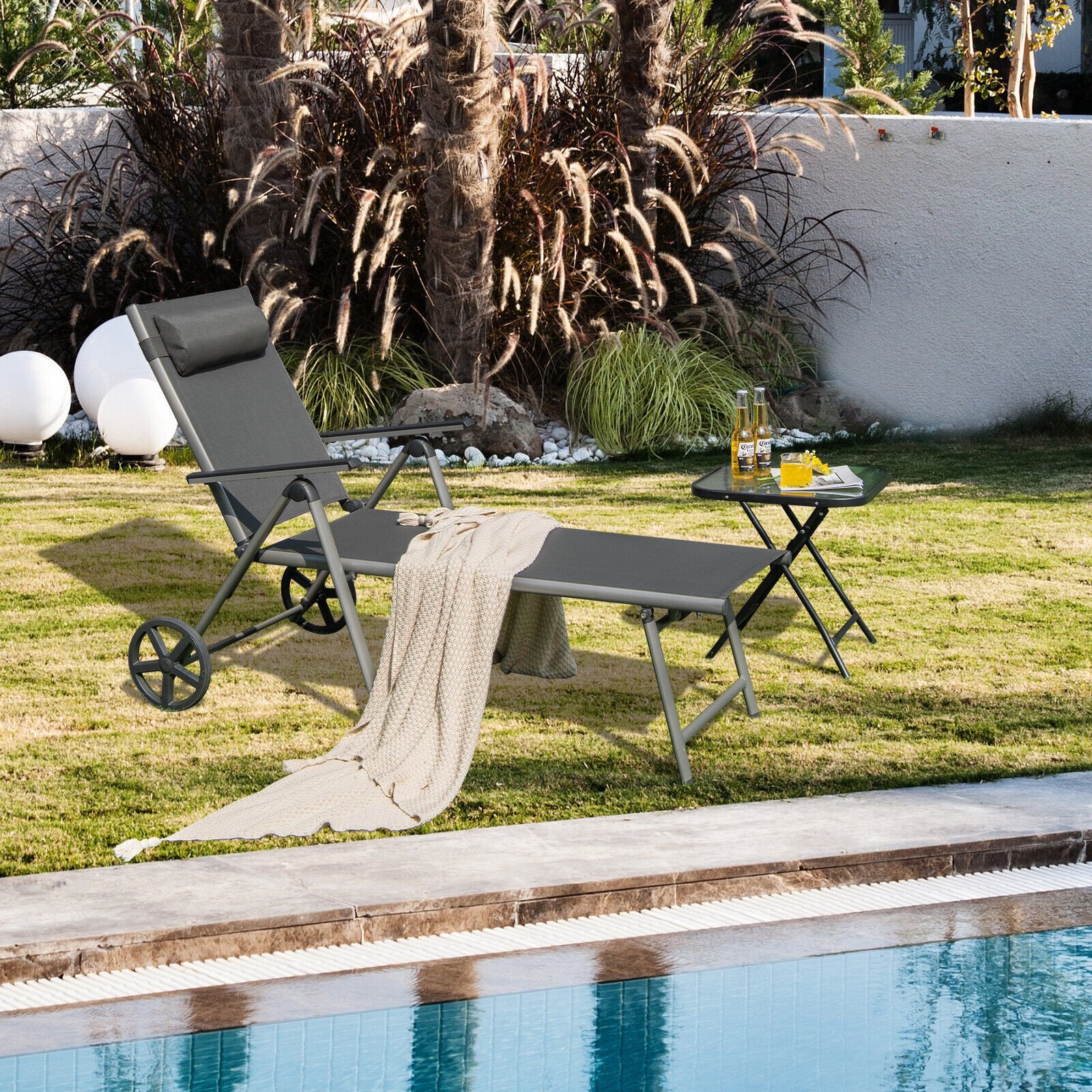 Adjustable Patio Folding Chaise Lounge Chair with Wheels, Black Outdoor Chaise Lounges   at Gallery Canada