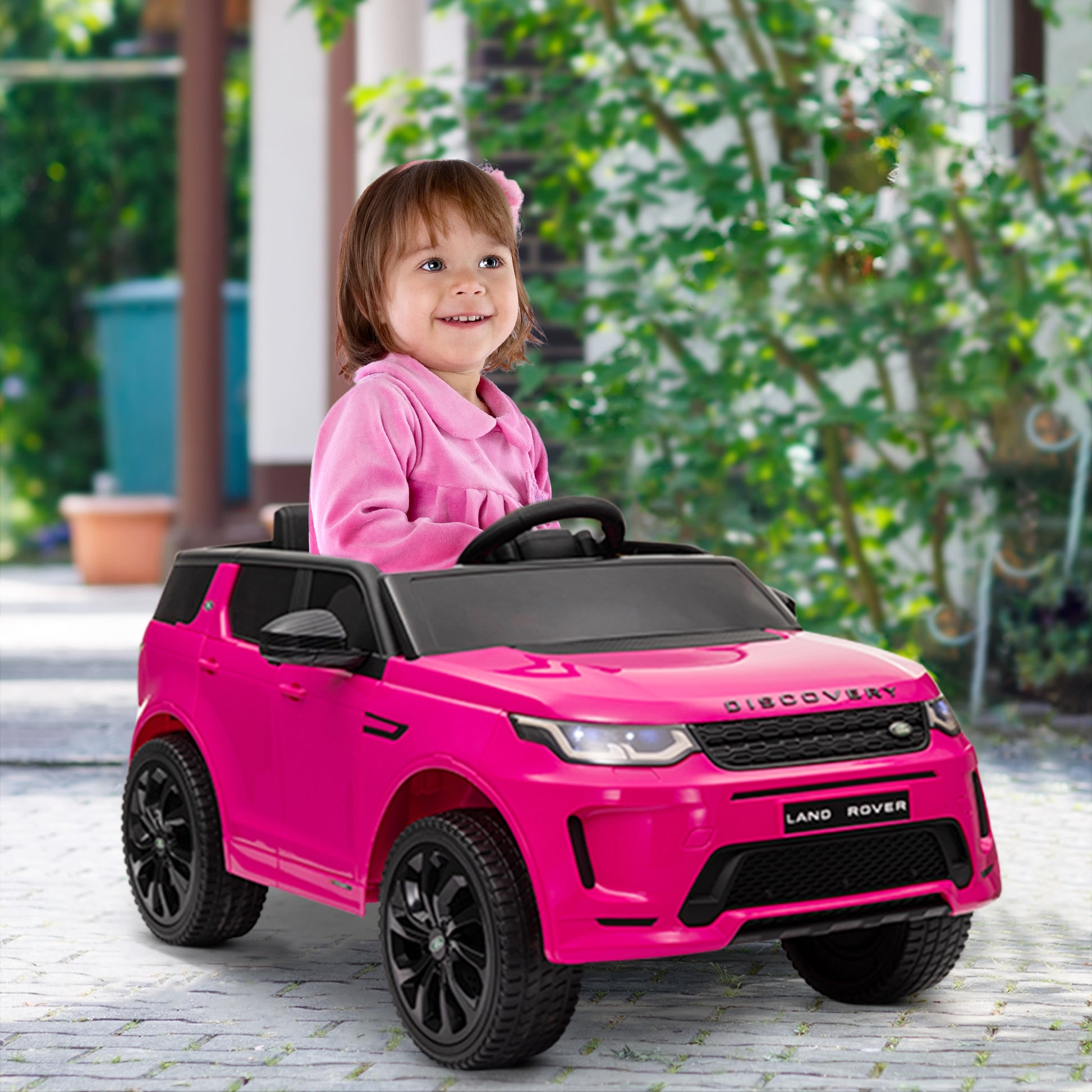 Land Rover Discovery Sport Licensed 12V Ride on Car w/ Remote, Soft Start, LED Lights, Music Horn, Pink Electric Toy Cars   at Gallery Canada