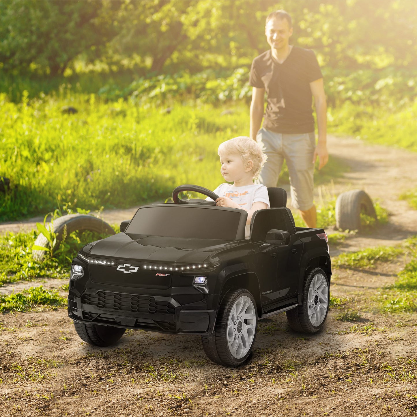 12V CHEVROLET SILVERADO EV RST Licensed Kids Car w/ Remote, Spring Suspension, Soft Start, Training Wheels, Black Electric Toy Cars Black  at Gallery Canada