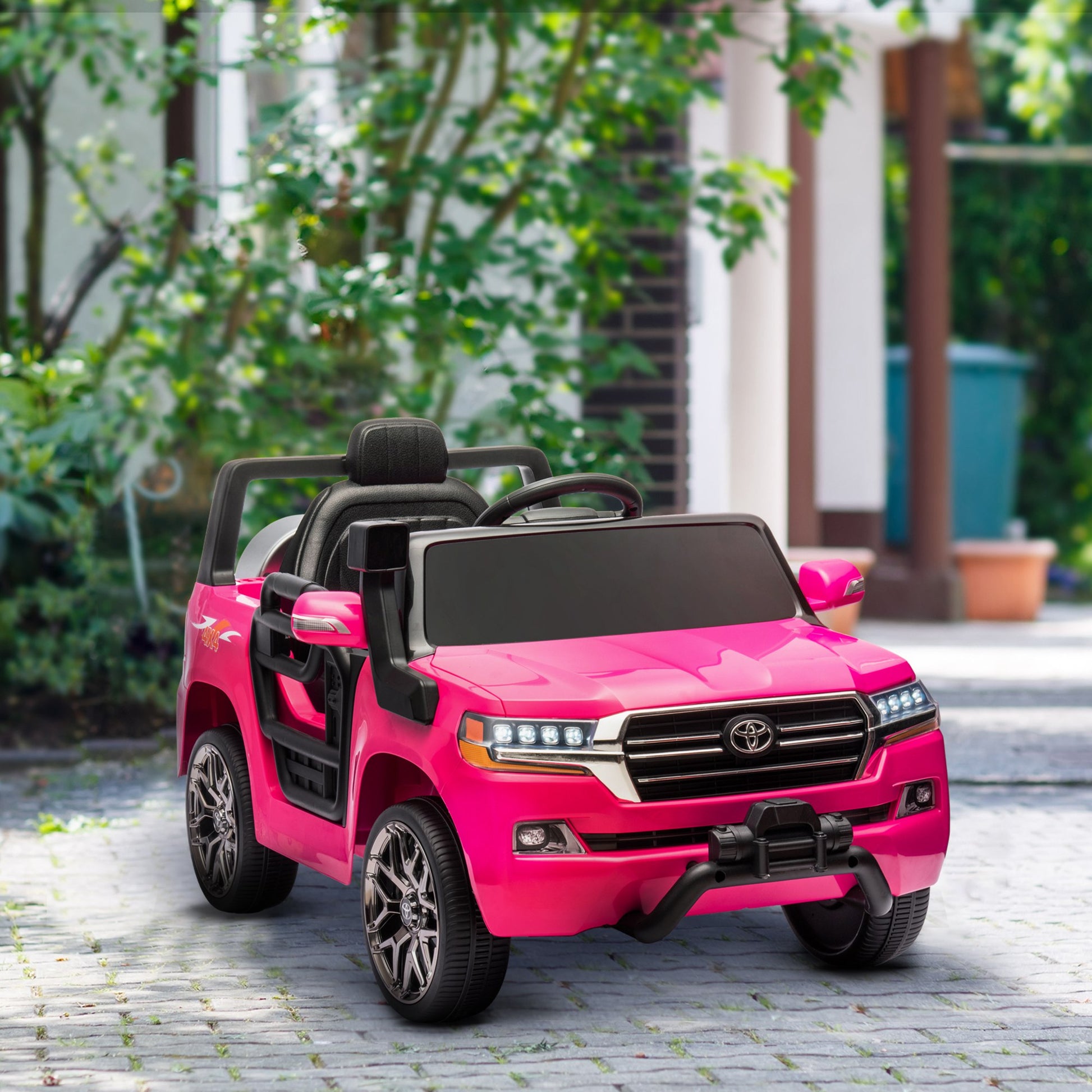 12V Toyota LAND CRUISER Licensed Kids Car w/ Remote Control, Four Wheel Spring Suspension, Soft Start, LED Light, Pink Electric Toy Cars   at Gallery Canada