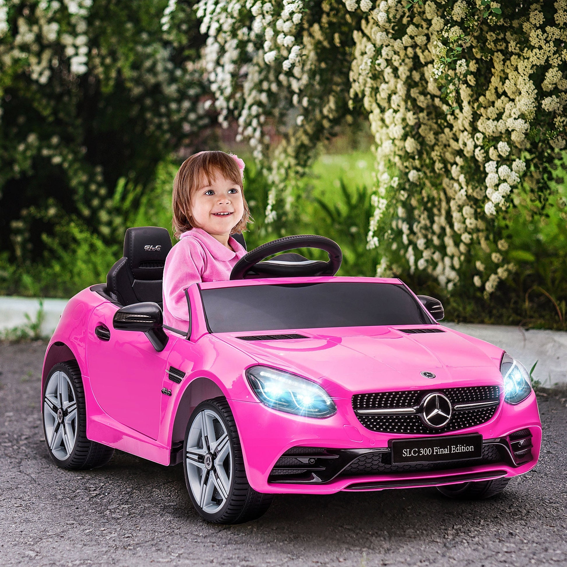 12V Ride On Car with Parent Remote Control Two Motors Music Lights Suspension Wheels for 3-6 Years Pink Electric Toy Cars   at Gallery Canada