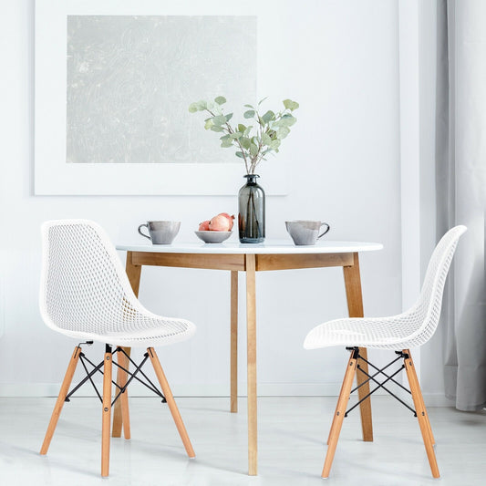 2 Pieces Modern Plastic Hollow Chair Set with Wood Leg, White Dining Chairs   at Gallery Canada