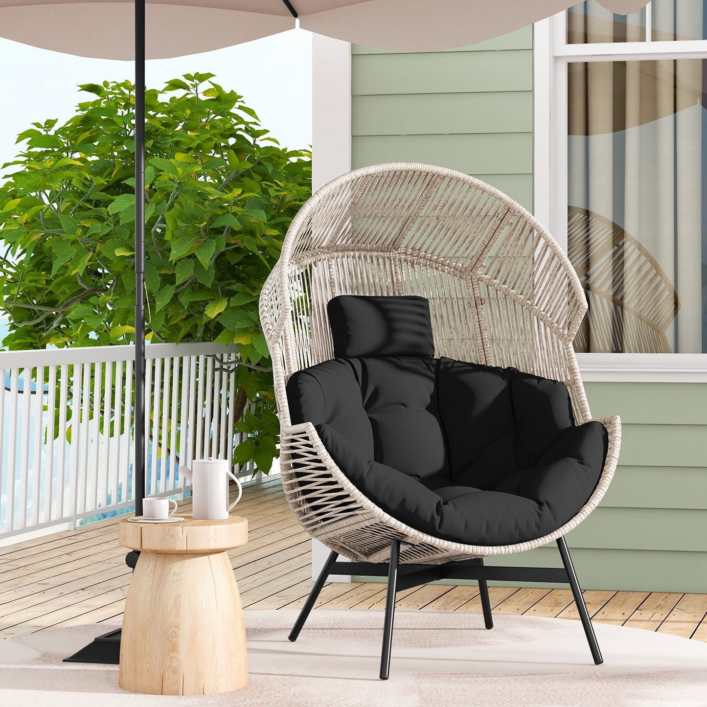 Wicker Oversized Egg Style Chair with Cushions and Headrest, Black Outdoor Chaise Lounges   at Gallery Canada