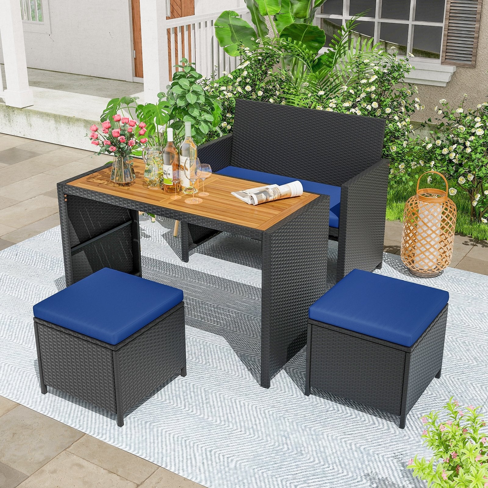 4 Piece Outdoor Dining Set with Wood Topped Dining Table  Rattan Loveseat Chair and 2 Ottomans, Navy Patio Conversation Sets   at Gallery Canada