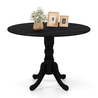 Wooden Dining Table with Round Tabletop and Curved Trestle Legs, Black Dining Tables   at Gallery Canada