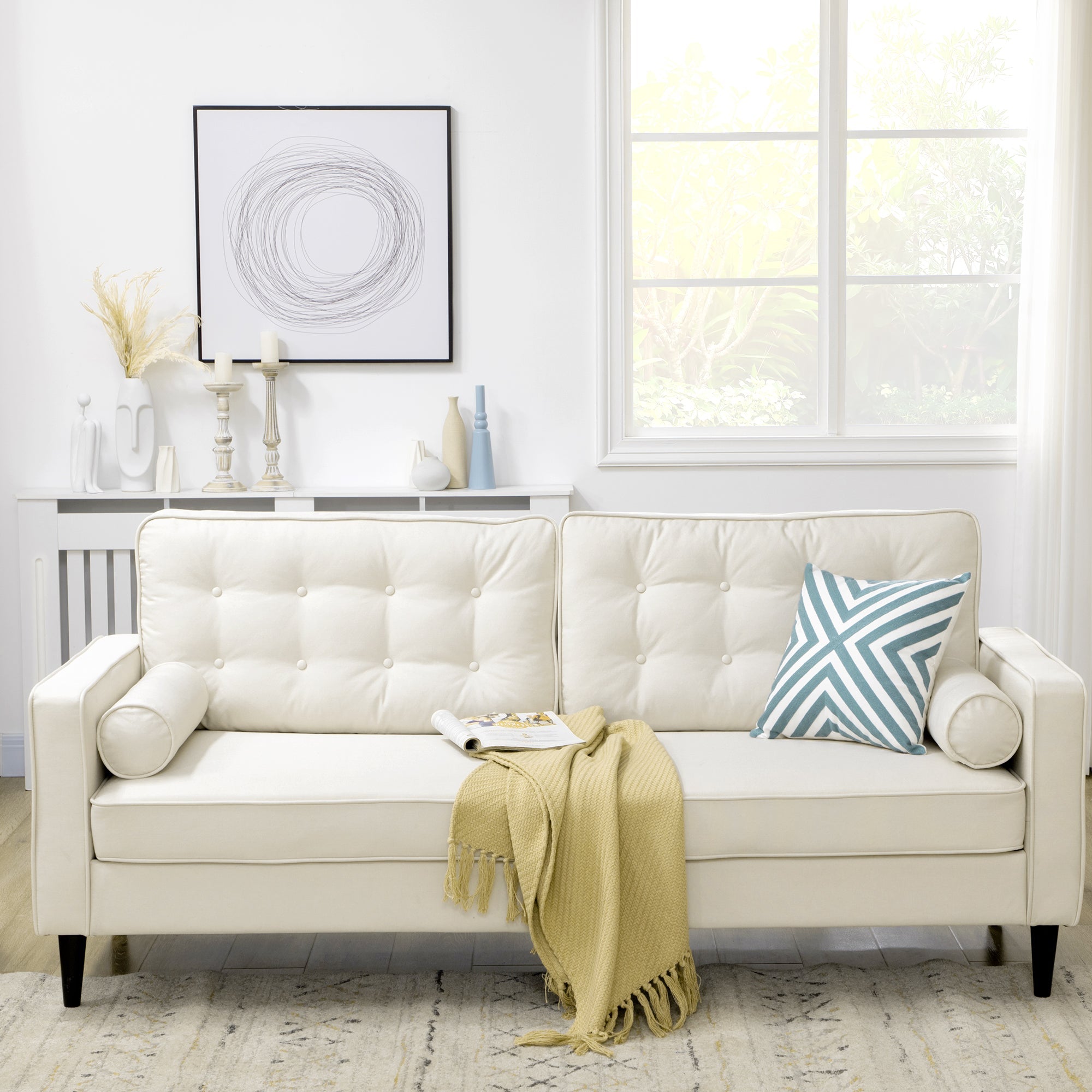 Mid-Century Sofa, Couch with Button-Tufted Back Cushion, Velvet Feel Fabric Upholstery, 2 Cylindrical Pillows and Rubber Wood Legs, Cream White 3-Seater Sofas   at Gallery Canada