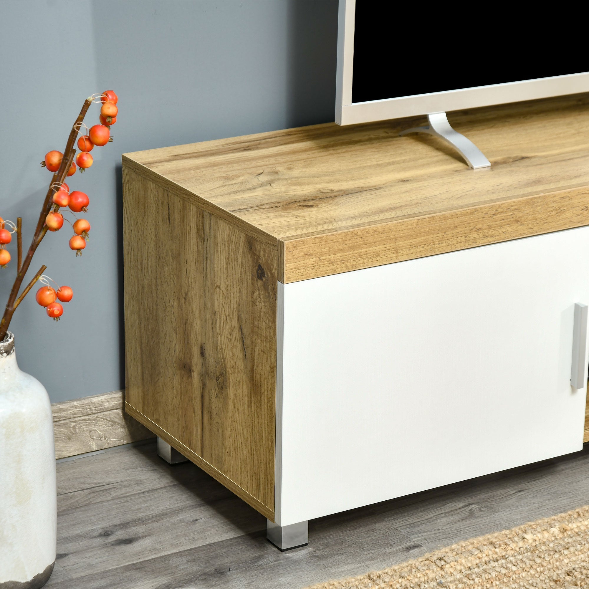 Modern TV Stand for TVs Up to 63 Inches, TV Cabinet with Storage Shelves and Cable Holes for Living Room Bedroom, Oak and White TV Stands   at Gallery Canada