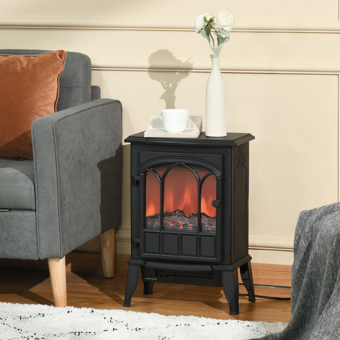 Electric Fireplace Stove, Freestanding Fireplace Heater with Realistic Flame, Adjustable brightness, Overheating Safety System, Black Electric Fireplaces   at Gallery Canada