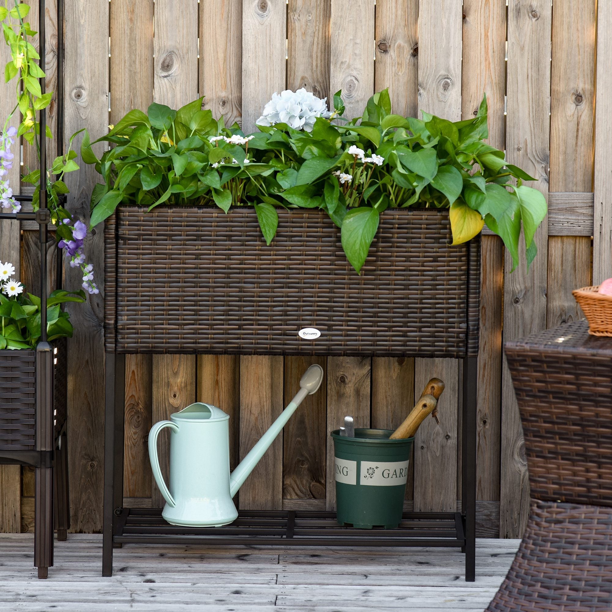 Modern Elevated Metal Raised Garden Bed with Rattan Wicker Look, Underneath Tool Storage Rack, Brown Plant Stands   at Gallery Canada